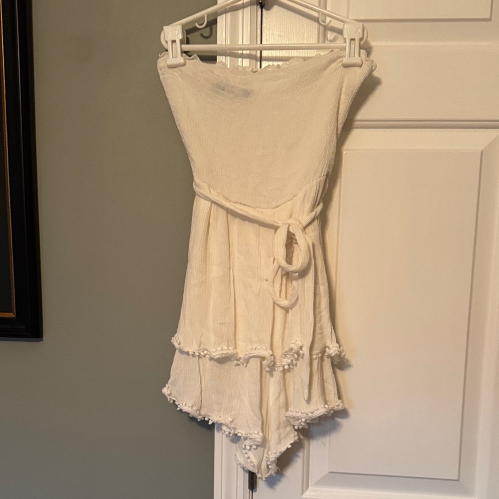 Simplee Apparel Cream Strapless Pom-Trim Romper with Tie Waist